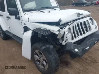 2017 Jeep Wrangler Unlimited 75th Anniversary z VIN 1C4BJWEG9HL684152, wystawiony jako IAAI lot #41880074 z przebiegiem 91 847 mil mil oraz . Historia ofert i sprzedaży dostępna na DreamBid. Obrazek 6.