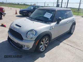 2013 MINI Hardtop S with VIN WMWSV3C54DT476756, listed as a IAAI auction lot 42691529 with 130,877 mi miles and . Bid and sale history available at DreamBid. Image 2.