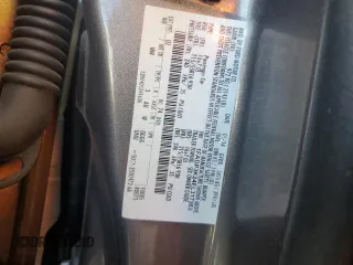 2014 Ford Focus SE z VIN 1FADP3K24EL317353, wystawiony jako Copart lot #57181215 z przebiegiem 144 495 mil mil oraz Szkoda całkowita • Salvage title. Historia ofert i sprzedaży dostępna na DreamBid. Obrazek 12.