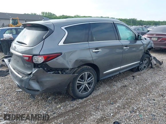 2020 Infiniti QX60 Pure with VIN 5N1DL0MM2LC517417, listed as a IAAI auction lot 42240908 with 52,022 mi miles and . Bid and sale history available at DreamBid. Image 4.