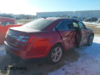 2015 Ford Taurus SEL z VIN 1FAHP2E85FG163421, wystawiony jako IAAI lot #41320489 z przebiegiem 165 618 mil mil oraz . Historia ofert i sprzedaży dostępna na DreamBid. Obrazek 4.