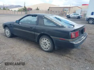 1986 Toyota Supra z VIN JT2MA70L4G0010843, wystawiony jako IAAI lot #41966751 z przebiegiem 205 187 mil mil oraz . Historia ofert i sprzedaży dostępna na DreamBid. Obrazek 3.