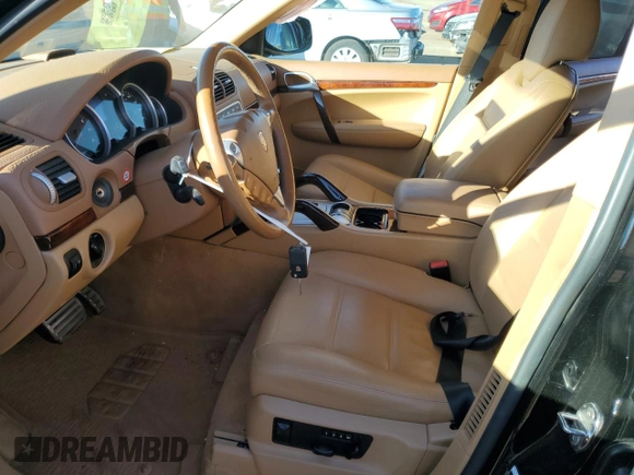 2009 Porsche Cayenne S with VIN WP1AB29P79LA43660, listed as a Copart auction lot 76612474 with 89,314 mi miles and Salvage title. Bid and sale history available at DreamBid. Image 7.