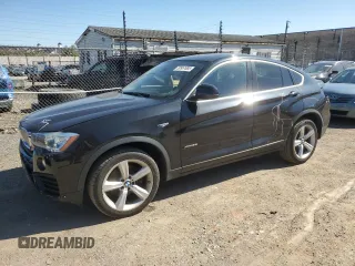 2016 BMW X4 xDrive28i with VIN 5UXXW3C58G0R19176, listed as a Copart auction lot 50957685 with 84,175 mi miles and Salvage title. Bid and sale history available at DreamBid. Image 1.