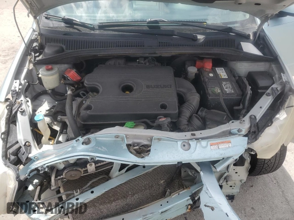 2009 Suzuki SX4 Touring AWD z VIN JS2YB417396203092, wystawiony jako Copart lot #53965685 z przebiegiem 153 701 mil mil oraz Szkoda całkowita • Salvage title. Historia ofert i sprzedaży dostępna na DreamBid. Obrazek 11.