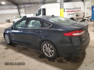 2020 Ford Fusion SE с VIN 3FA6P0HD7LR146595, выставлен на аукционе Copart как лот 61006345 с пробегом 128 741 миль миль и Чистый • Clean title. История ставок и продаж доступна на DreamBid. Изображение 2.