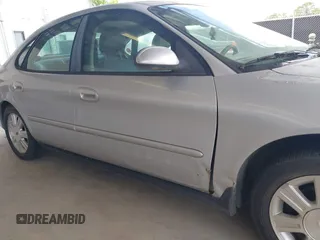 2005 Ford Taurus SEL with VIN 1FAFP56235A209879, listed as a IAAI auction lot 42537452 with 231,151 mi miles and . Bid and sale history available at DreamBid. Image 6.