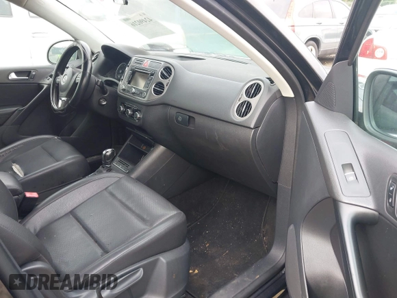 2011 Volkswagen Tiguan SEL with VIN WVGBV7AX6BW521525, listed as a IAAI auction lot 42490216 with 123,546 mi miles and . Bid and sale history available at DreamBid. Image 5.