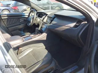2014 Ford Taurus SHO with VIN 1FAHP2KT8EG123342, listed as a IAAI auction lot 42095390 with 142,957 mi miles. Bid and sale history available at carsss.com. Image 5.