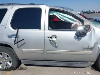 2010 GMC Yukon SLT with VIN 1GKUCCE01AR272822, listed as a IAAI auction lot 40572095 with 268,019 mi miles. Bid and sale history available at carsss.com. Image 13.