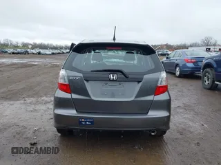 2013 Honda Fit Sport с VIN JHMGE8H56DC019458, выставлен на аукционе IAAI как лот 41912389 с пробегом Не указан миль и . История ставок и продаж доступна на DreamBid. Изображение 16.