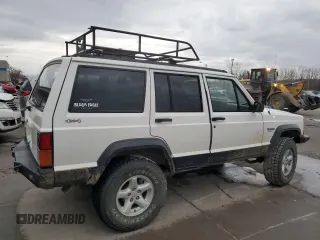 1996 Jeep Cherokee Sport with VIN 1J4FJ68S9TL284984, listed as a Copart auction lot 86307644 with 136,142 mi miles and Salvage Title. Bid and sale history available at carsss.com. Image 3.
