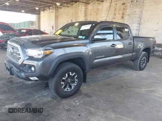 2017 Toyota Tacoma SR5 with VIN 3TMDZ5BN9HM022388, listed as a IAAI auction lot 42066091 with 73,346 mi miles. Bid and sale history available at carsss.com. Image 2.