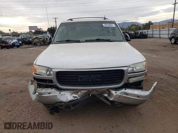 2003 GMC Yukon SLE with VIN 1GKEK13T43R205384, listed as a Copart auction lot 76916664 with 258,551 mi miles and Salvage Title. Bid and sale history available at carsss.com. Image 5.