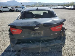 2015 Kia Optima SX Turbo with VIN 5XXGR4A6XFG454049, listed as a Copart auction lot 52217185 with 115,675 mi miles and Salvage Title. Bid and sale history available at carsss.com. Image 6.