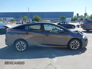 2016 Toyota Prius Four z VIN JTDKARFUXG3019426, wystawiony jako IAAI lot #42385785 z przebiegiem 94 838 mil mil oraz . Historia ofert i sprzedaży dostępna na DreamBid. Obrazek 13.