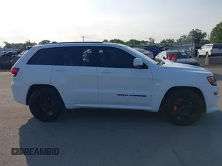 2016 Jeep Grand Cherokee SRT with VIN 1C4RJFDJ3GC503878, listed as a IAAI auction lot 42830257 with 82,661 mi miles and . Bid and sale history available at DreamBid. Image 13.