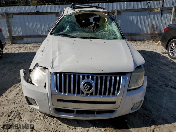 2009 Mercury Mariner Premier with VIN 4M2CU87G79KJ14527, listed as a Copart auction lot 76953474 with 0 mi miles and Salvage Title. Bid and sale history available at carsss.com. Image 5.