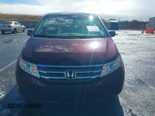 2013 Honda Odyssey LX z VIN 5FNRL5H25DB058422, wystawiony jako IAAI lot #42247200 z przebiegiem 137 053 mil mil oraz . Historia ofert i sprzedaży dostępna na DreamBid. Obrazek 12.