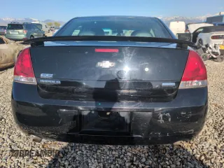 2013 Chevrolet Impala Police z VIN 2G1WD5E3XD1162414, wystawiony jako Copart lot #53910565 z przebiegiem 146 081 mil mil oraz Szkoda całkowita • Salvage title. Historia ofert i sprzedaży dostępna na DreamBid. Obrazek 6.