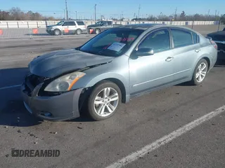 2010 Nissan Altima 3.5 SR with VIN 1N4BL2APXAN457125, listed as a IAAI auction lot 41337584 with 102,256 mi miles. Bid and sale history available at carsss.com. Image 2.