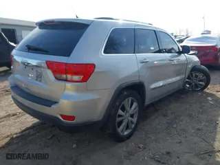 2011 Jeep Grand Cherokee Laredo with VIN 1J4RR4GTXBC678304, listed as a IAAI auction lot 41088309 with 139,559 mi miles. Bid and sale history available at carsss.com. Image 4.