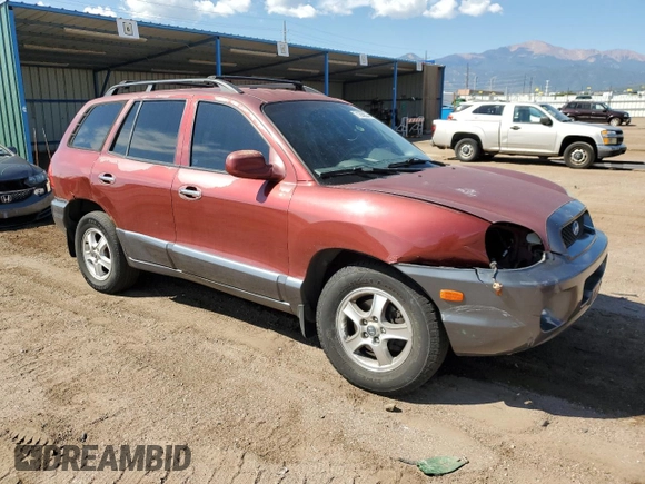 2002 Hyundai Santa Fe GLS with VIN KM8SC73D42U231286, listed as a Copart auction lot 71290624 with 187,534 mi miles and Salvage Title. Bid and sale history available at carsss.com. Image 4.