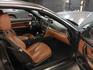 2014 BMW 4 Series 428i xDrive with VIN WBA3T1C59EPS98299, listed as a IAAI auction lot 41741235 with 93,000 mi miles and . Bid and sale history available at carsss.com. Image 5.