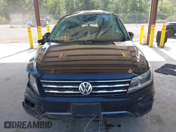 2021 Volkswagen Tiguan S with VIN 3VV0B7AX1MM098300, listed as a IAAI auction lot 42574636 with 53,559 mi miles and . Bid and sale history available at DreamBid. Image 12.
