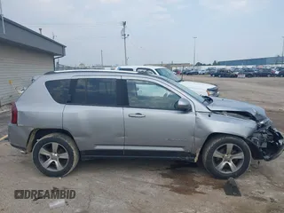 2016 Jeep Compass High Altitude with VIN 1C4NJDEBXGD730764, listed as a IAAI auction lot 42371491 with 125,302 mi miles and . Bid and sale history available at DreamBid. Image 13.