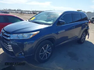 2017 Toyota Highlander XLE with VIN 5TDKZRFH2HS526283, listed as a IAAI auction lot 41669159 with 122,112 mi miles and . Bid and sale history available at DreamBid. Image 2.
