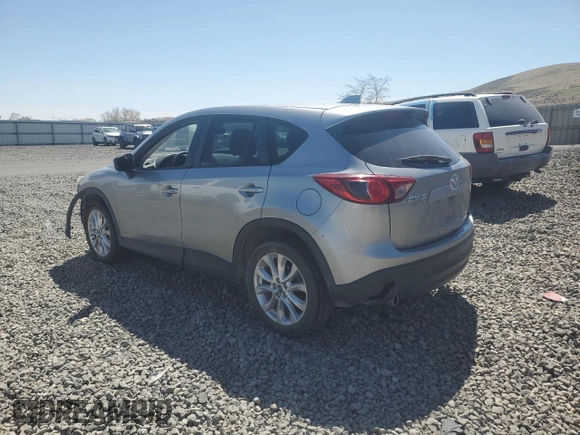 2015 Mazda CX-5 Grand Touring with VIN JM3KE4DY5F0540655, listed as a Copart auction lot 52893155 with 152,279 mi miles and Salvage Title. Bid and sale history available at carsss.com. Image 2.