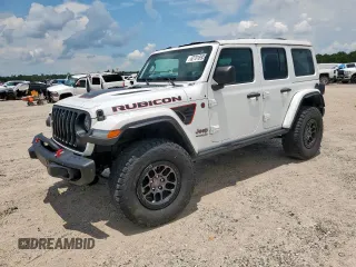 2021 Jeep Wrangler Unlimited Rubicon with VIN 1C4JJXFG1MW849460, listed as a Copart auction lot 62701895 with 54,517 mi miles and Salvage title. Bid and sale history available at DreamBid. Image 1.