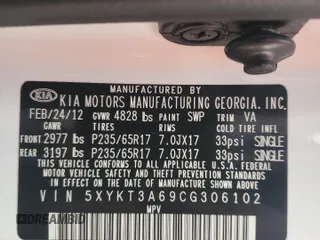 2012 Kia Sorento LX with VIN 5XYKT3A69CG306102, listed as a Copart auction lot 52996225 with 173,640 mi miles and Salvage Title. Bid and sale history available at carsss.com. Image 13.