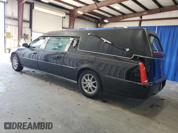 2011 Cadillac DTS Professional Limousine z VIN 1GE7K9C61BU600591, wystawiony jako Copart lot #55618735 z przebiegiem 31 702 mil mil oraz Tytuł czysty. Historia ofert i sprzedaży dostępna na DreamBid. Obrazek 2.