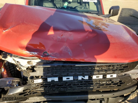 2024 Ford Bronco Wildtrak with VIN 1FMEE2BP5RLA54608, listed as a Copart auction lot 84276804 with 7,011 mi miles and Salvage Title. Bid and sale history available at carsss.com. Image 14.