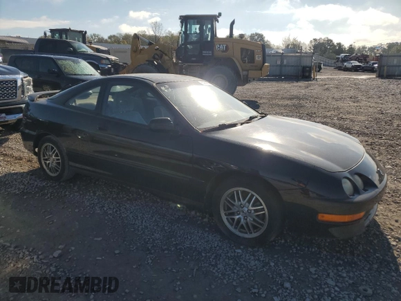 1999 Acura Integra LS with VIN JH4DC4451XS014086, listed as a Copart auction lot 83095464 with 106,452 mi miles and Salvage Title. Bid and sale history available at DreamBid. Image 4.