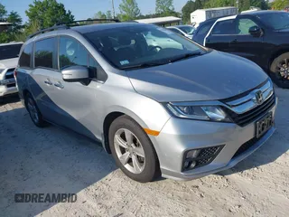 2019 Honda Odyssey EX with VIN 5FNRL6H58KB047377, listed as a IAAI auction lot 42023301 with 70,087 mi miles. Bid and sale history available at carsss.com. Image 1.
