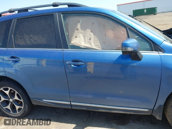 2015 Subaru Forester XT Touring with VIN JF2SJGWC7FH448103, listed as a IAAI auction lot 42182003 with 157,272 mi miles and . Bid and sale history available at DreamBid. Image 13.