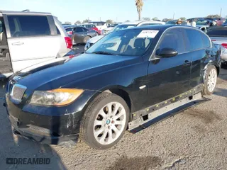 2006 BMW 3 Series 330i with VIN WBAVB33536KS34412, listed as a IAAI auction lot 41872877 with 196,697 mi miles. Bid and sale history available at carsss.com. Image 2.