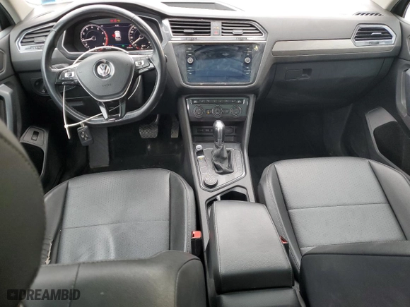 2019 Volkswagen Tiguan SE with VIN 3VV2B7AX8KM024779, listed as a Copart auction lot 53458305 with 67,337 mi miles and Salvage Title. Bid and sale history available at carsss.com. Image 8.