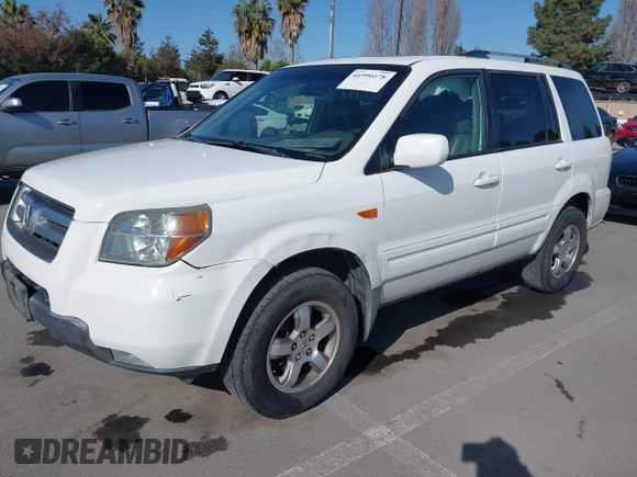 2006 Honda Pilot EX-L with VIN 2HKYF18746H517810, listed as a IAAI auction lot 41990178 with 184,679 mi miles and . Bid and sale history available at DreamBid. Image 2.
