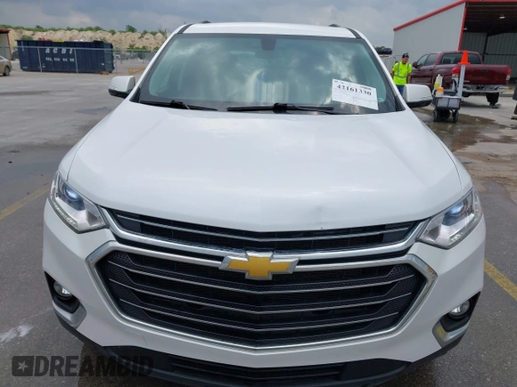 2020 Chevrolet Traverse LT Cloth z VIN 1GNERGKW3LJ127398, wystawiony jako IAAI lot #42161330 z przebiegiem 96 140 mil mil oraz . Historia ofert i sprzedaży dostępna na DreamBid. Obrazek 6.