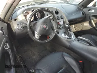 2007 Pontiac Solstice z VIN 1G2MB35B97Y117728, wystawiony jako Copart lot #87267724 z przebiegiem Nie podano mil oraz Szkoda całkowita • Salvage title. Historia ofert i sprzedaży dostępna na DreamBid. Obrazek 8.