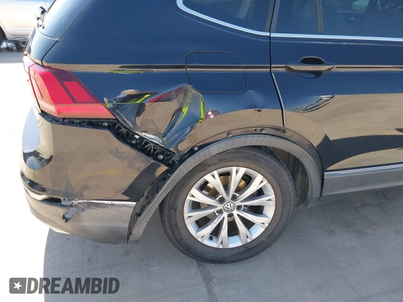 2018 Volkswagen Tiguan SEL with VIN 3VV3B7AX3JM064061, listed as a IAAI auction lot 41772564 with 95,395 mi miles and . Bid and sale history available at DreamBid. Image 6.