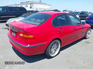 2003 BMW 3 Series 325i with VIN WBAEV33433KL81985, listed as a IAAI auction lot 42397149 with 212,346 mi miles and . Bid and sale history available at DreamBid. Image 4.