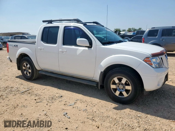 2012 Nissan Frontier Pro-4X with VIN 1N6AD0EV3CC468057, listed as a Copart auction lot 60432675 with 100,088 mi miles and Salvage title. Bid and sale history available at DreamBid. Image 4.