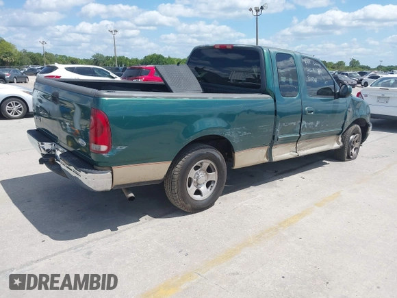 2000 Ford F-150 XL with VIN 1FTZX1729YNB93649, listed as a IAAI auction lot 42069599 with 1 mi miles. Bid and sale history available at carsss.com. Image 4.