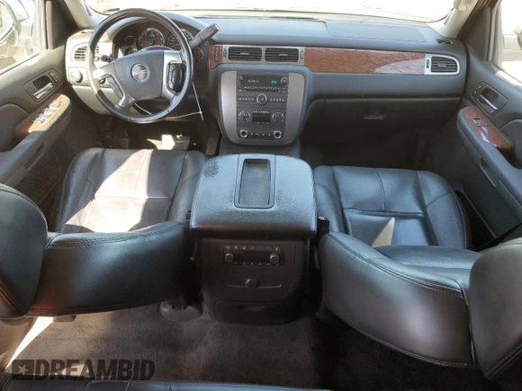 2007 GMC Yukon SLE z VIN 1GKFK13007J260249, wystawiony jako Copart lot #57646525 z przebiegiem 325 491 mil mil oraz Szkoda całkowita • Salvage title. Historia ofert i sprzedaży dostępna na DreamBid. Obrazek 8.