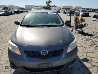 2010 Toyota Corolla with VIN JTDBU4EE3AJ076512, listed as a Copart auction lot 54990255 with 215,041 mi miles and Clean Title. Bid and sale history available at carsss.com. Image 5.
